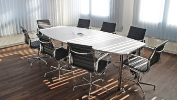 Photo of a boardroom table where boards of advisers might sit