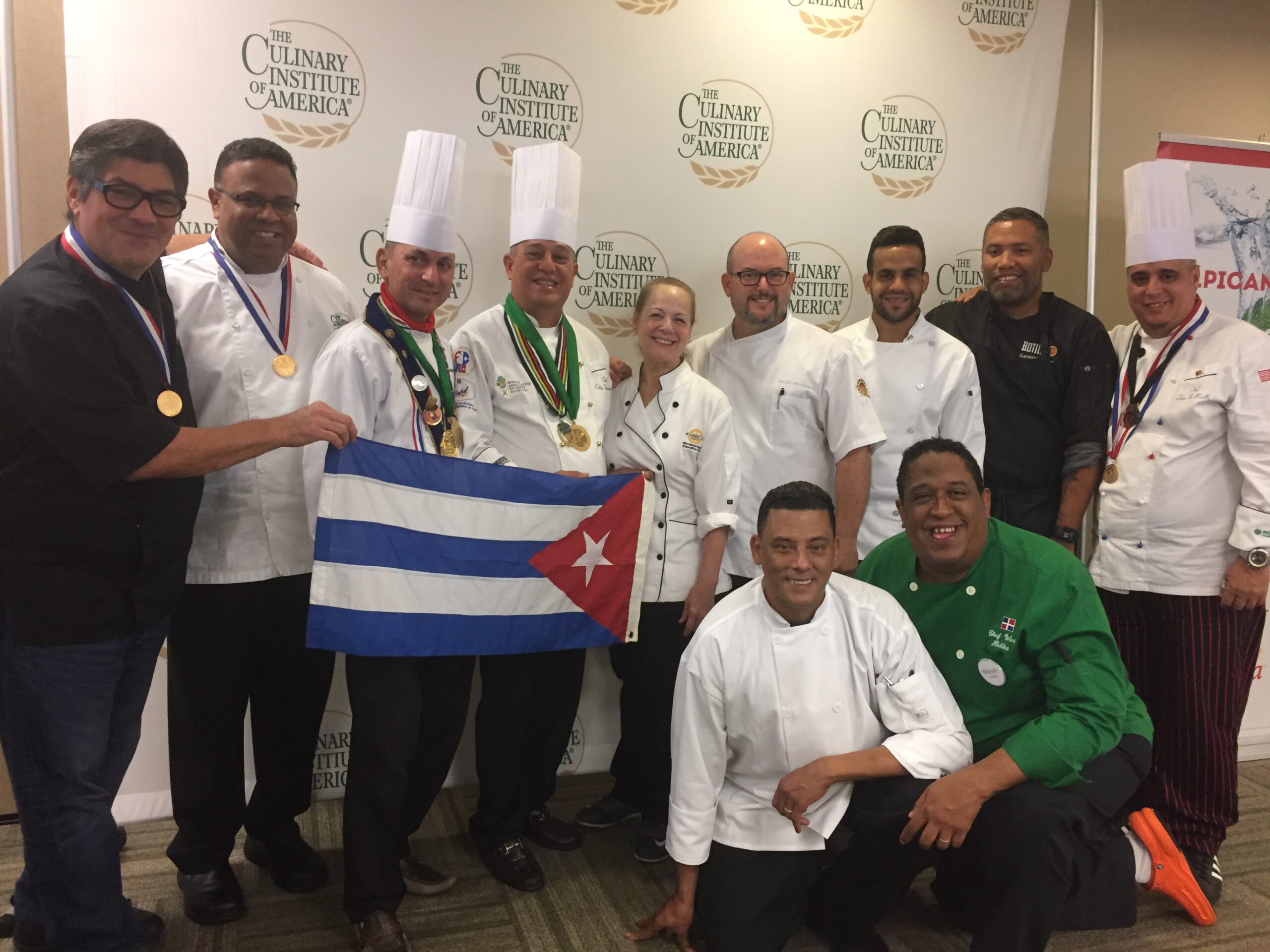 Millan with chef presenters at Arriba El Caribe!