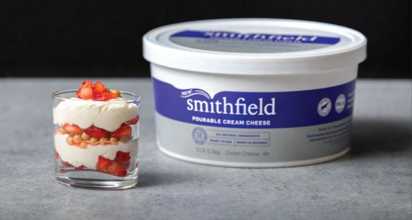 Pourable cream cheese creates new possibilities for pastry chefs [Image: Smithfield Pourable Cream Cheese and a strawberry cheesecake dessert]