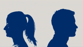 Two people facing away from each other to illustrate a negative conversation