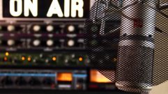 A radio mic and an "on air" sign are shown.