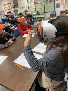 students using virtual reality glasses