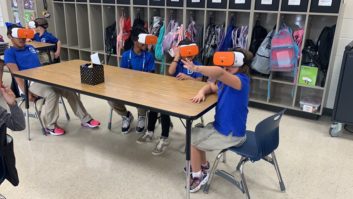 students using virtual reality glasses