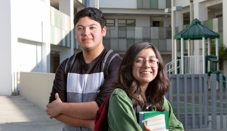 2 students in front of building competency-based education