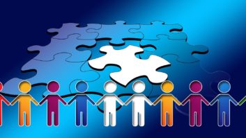 clipart people holding hands with puzzle piece in background ASCD, ISTE merge