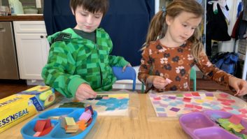 Male and female students using colored tissue paper for "stained glass" for article helping kids see themselves in STEM