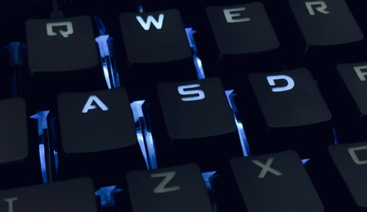 backlit letters on computer keyboard for article on cybersecurity approach